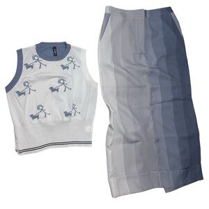 Women’s 2-piece sleeveless crop sweater and vertical-striped maxi skirt w/ split